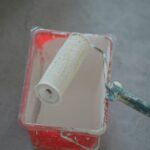 a toothbrush in a plastic container